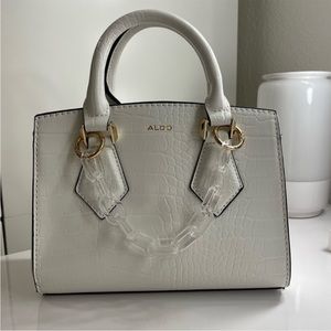 Aldo’s White Handbag